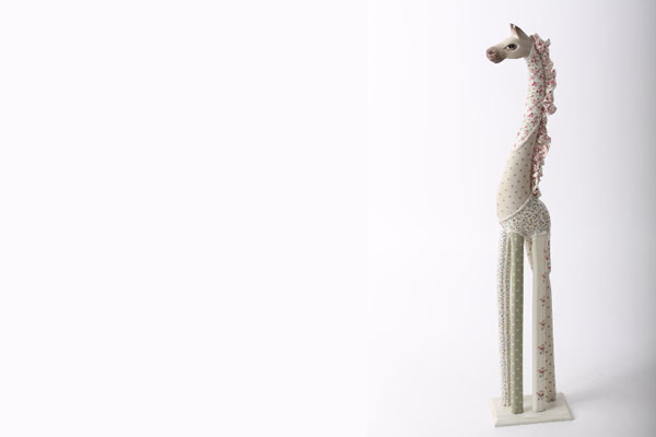 Figura drvena žirafa obložena platnom