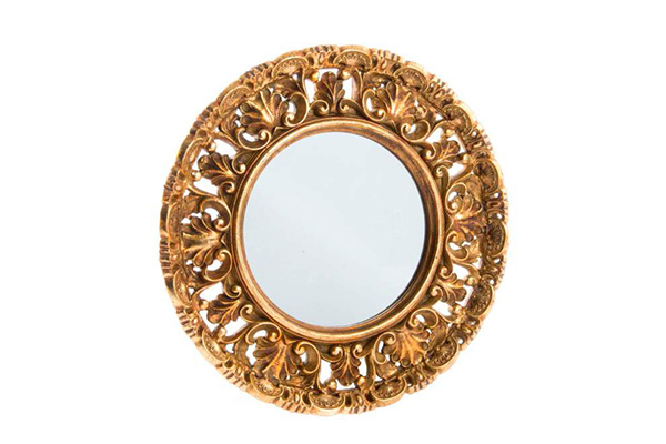 Okruglo ogledalo sa zlatnim okvirom